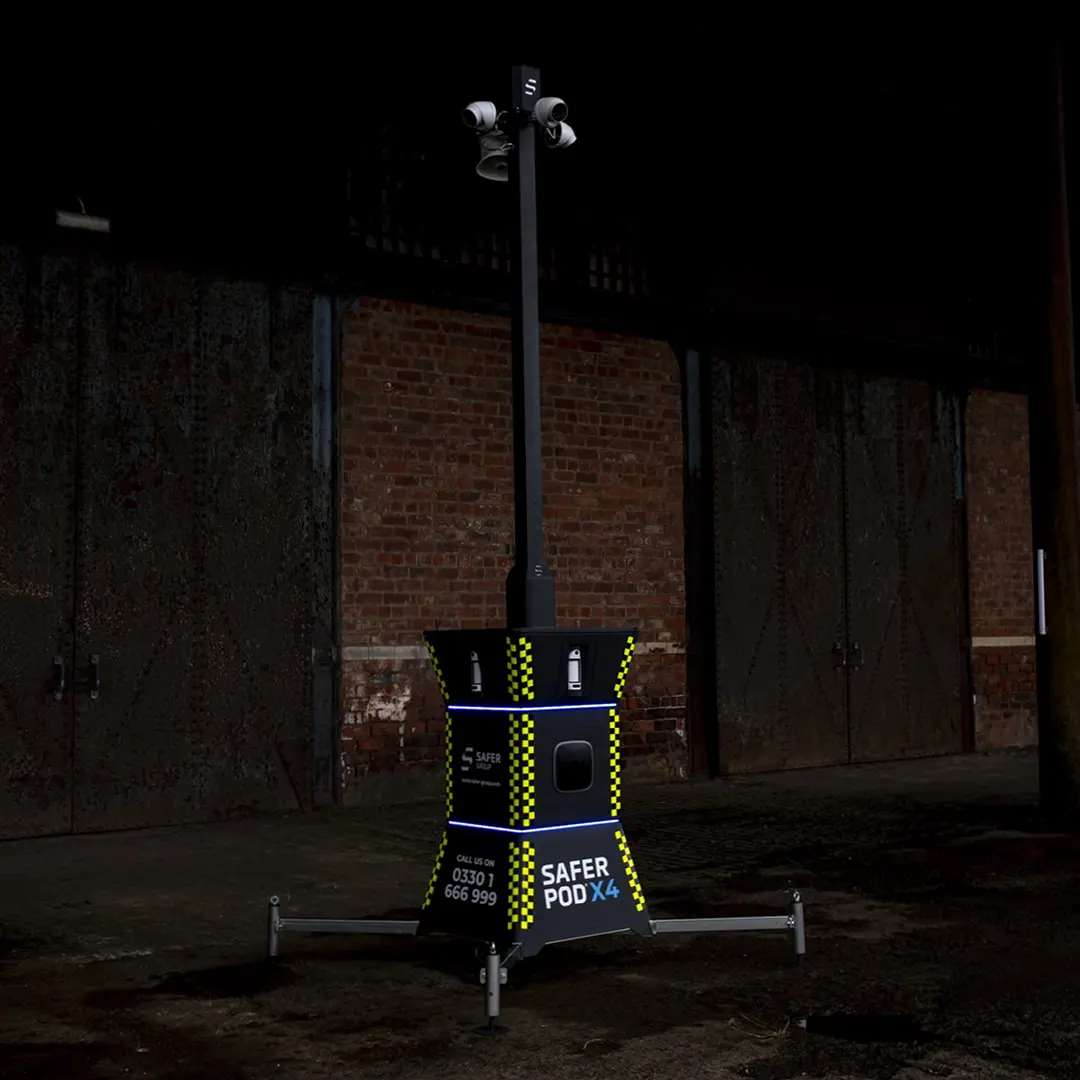Safer Pod X4 security pod outside a dark warehouse