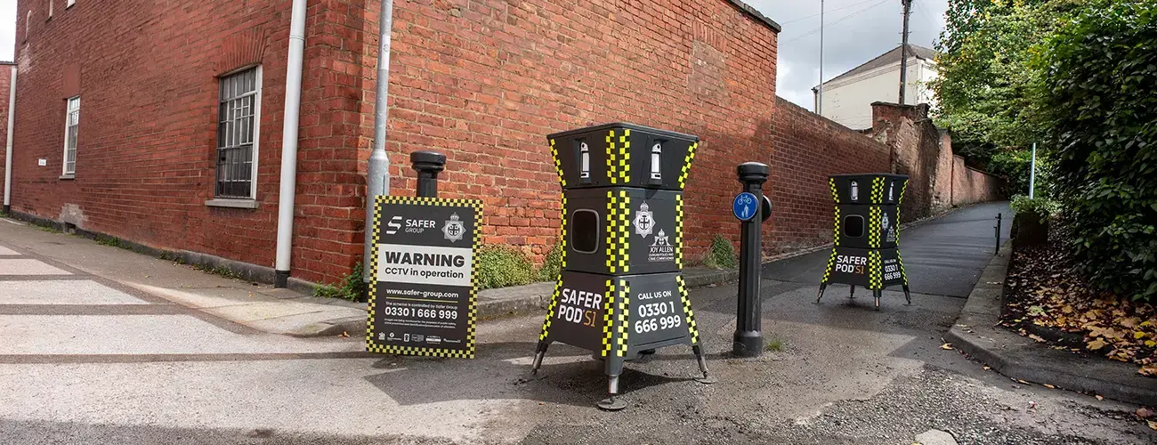 Safer POD S1 with Darlington Constabulary branding, located in an alleyway. A warning notice is beside it.